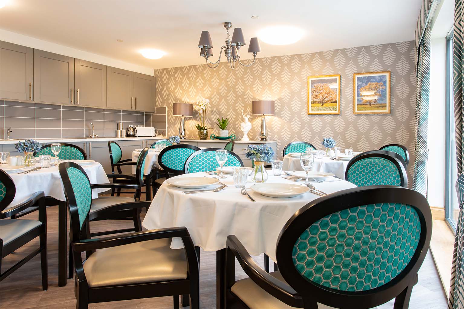 dining room with tables and chairs at trinity house care home