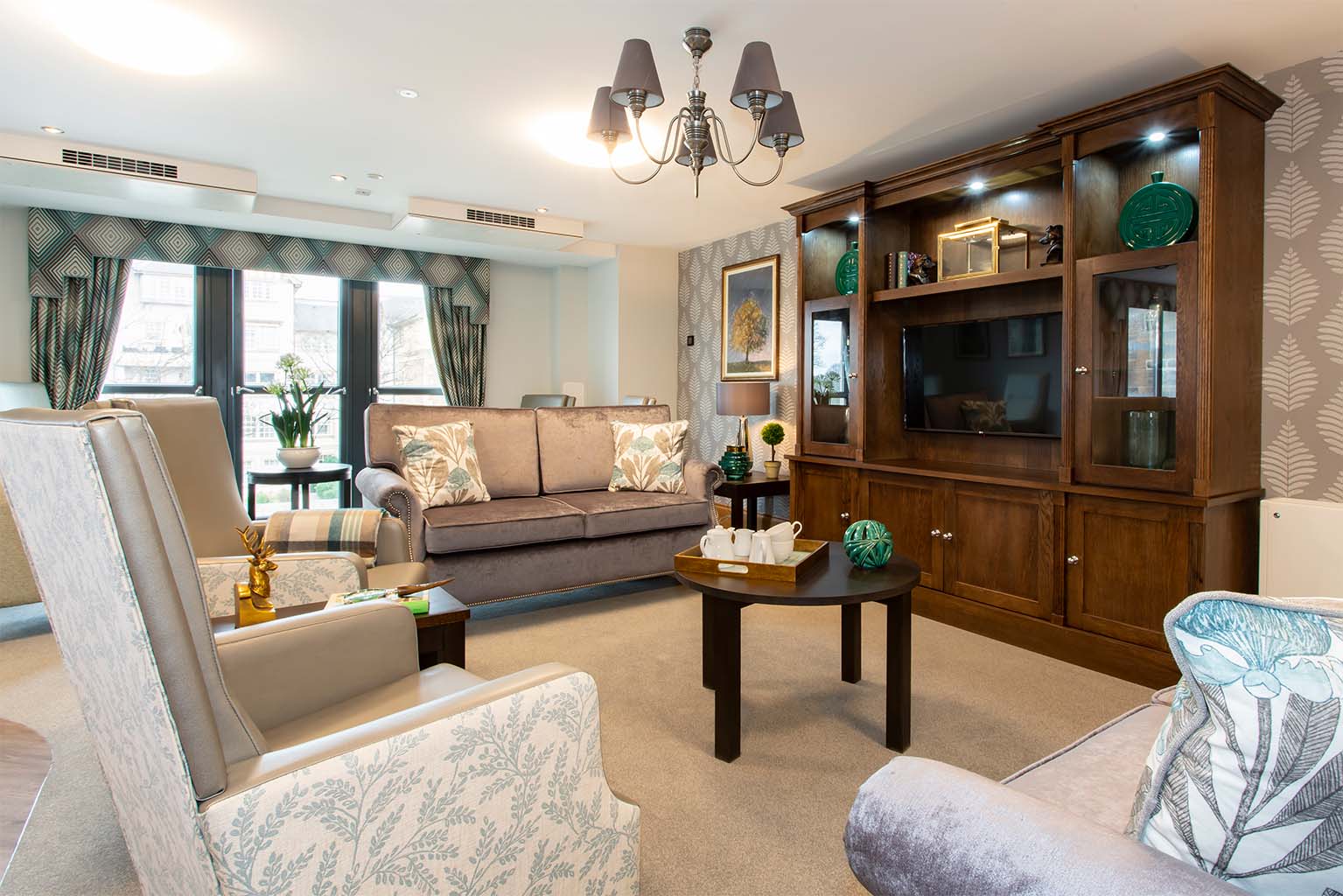 communal lounge with sofa and sideboard
