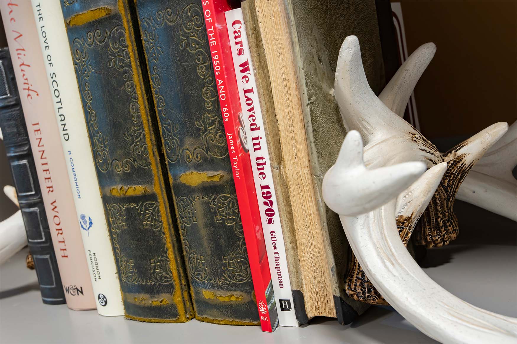 stack of books on a shelf