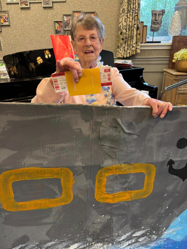 Residents at Trinity House enjoying a colourful &quot;cruise-themed&quot; activity