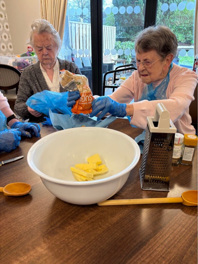 Residents baking at Trinity house care home