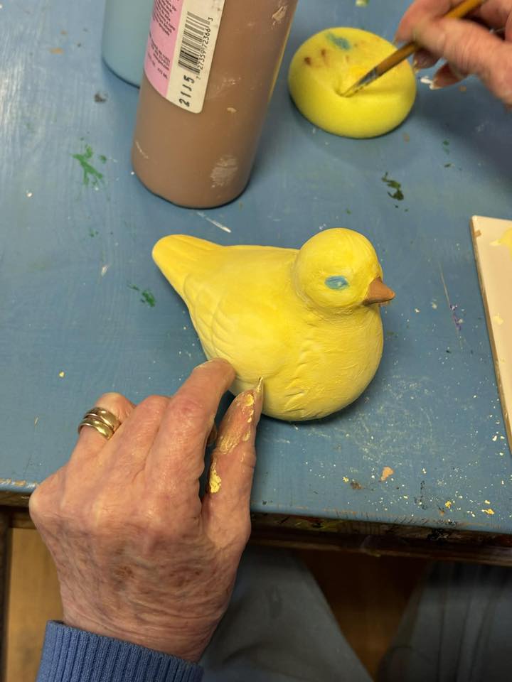 painted yellow ceramic bird